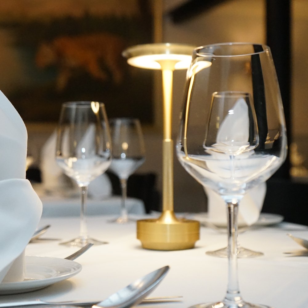 Glassware set on a table at Voujon